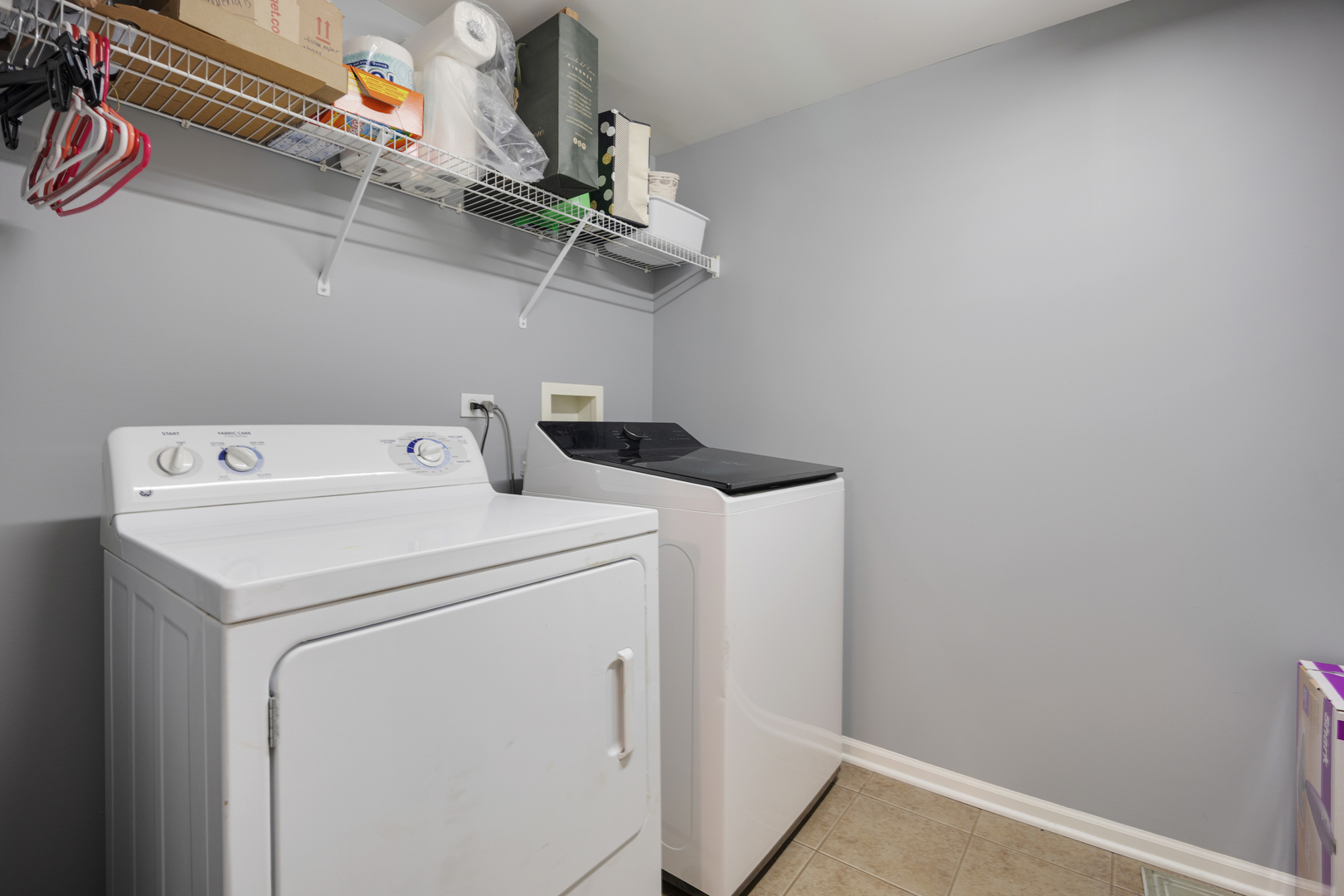 225 Main Street, Unit 216 Roselle, IL 60172 - Photo 15 of 20 a utility room with dryer and washer