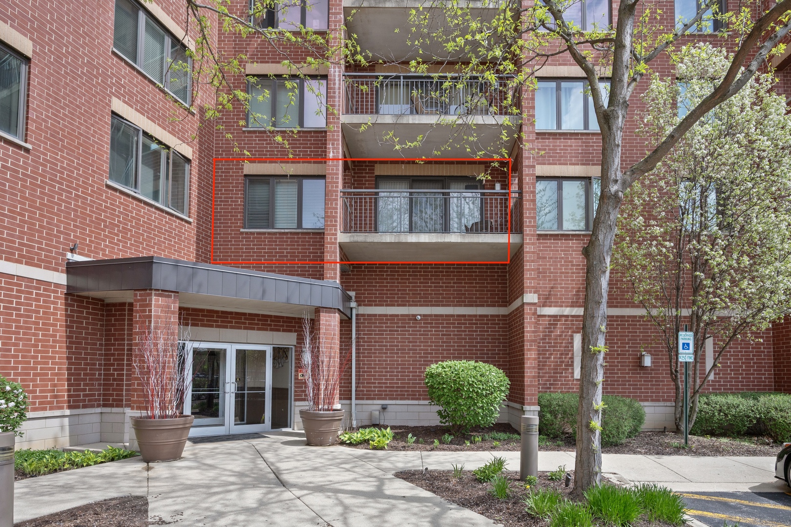 225 Main Street, Unit 216 Roselle, IL 60172 - Photo 17 of 20 a front view of a multi story residential apartment building