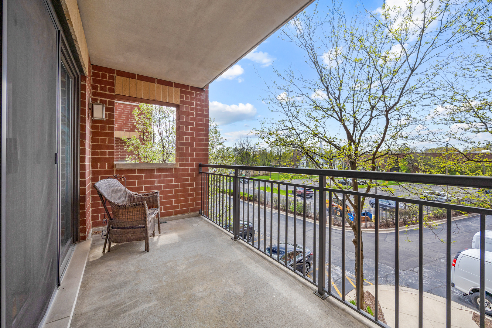 225 Main Street, Unit 216 Roselle, IL 60172 - Photo 18 of 20 a view of balcony with furniture