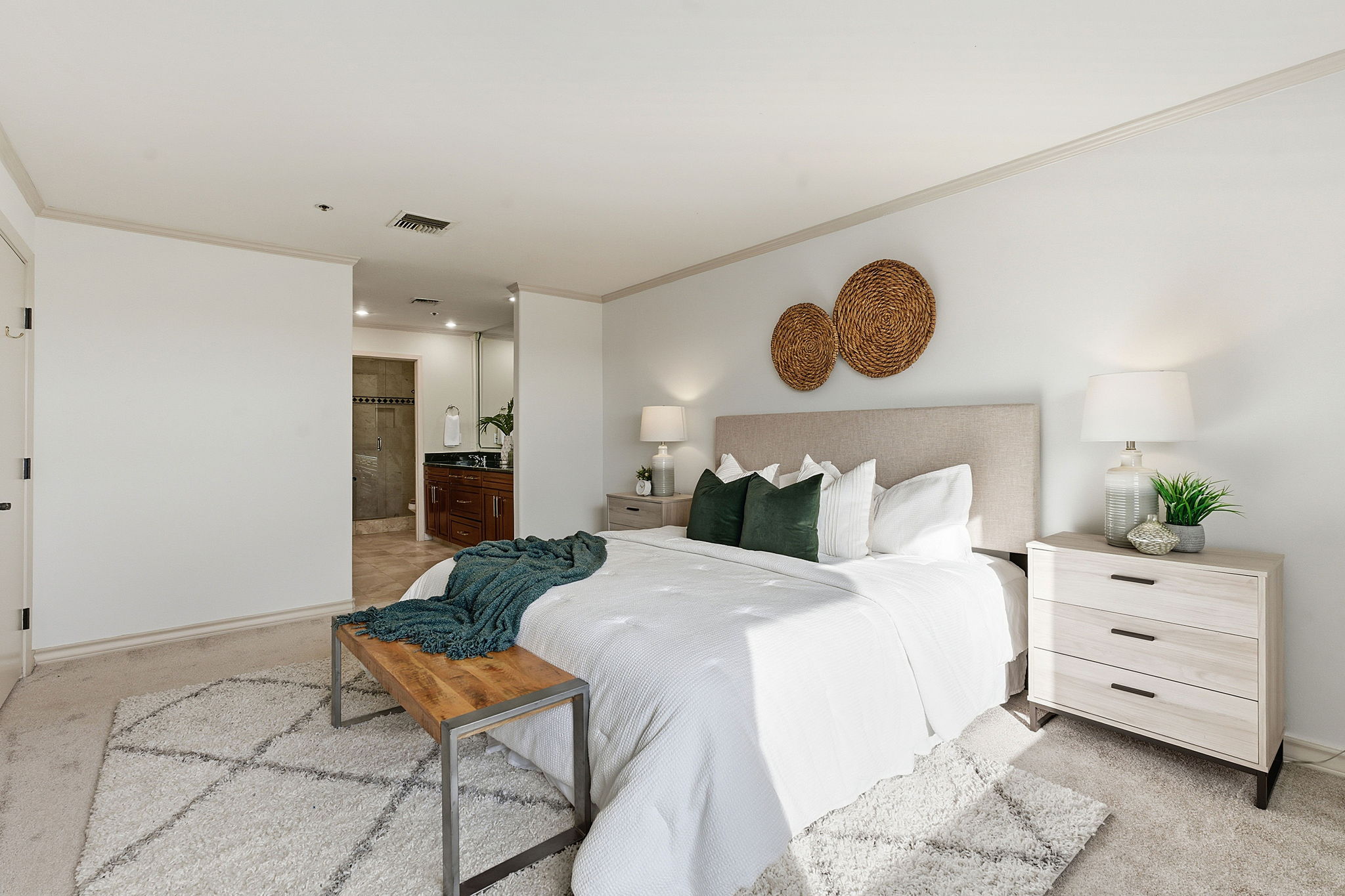 40 North Interstate Highway 35, Unit 10B4 Austin, TX 78701 - Photo 15 of 39 a bedroom with a bed and cabinets