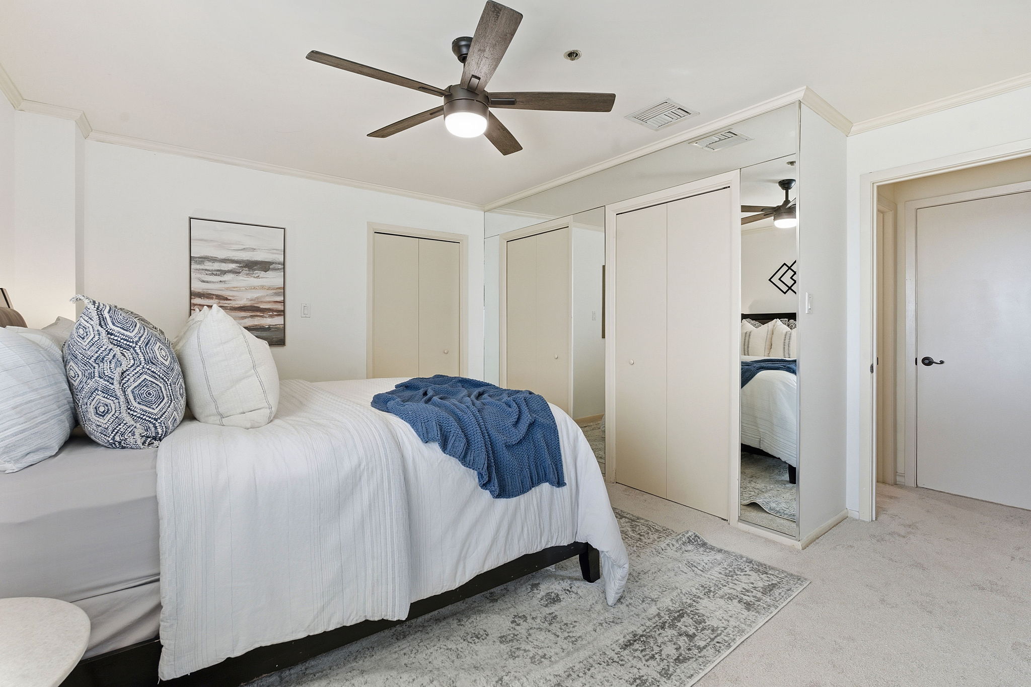 40 North Interstate Highway 35, Unit 10B4 Austin, TX 78701 - Photo 21 of 39 a bedroom with a bed and a window