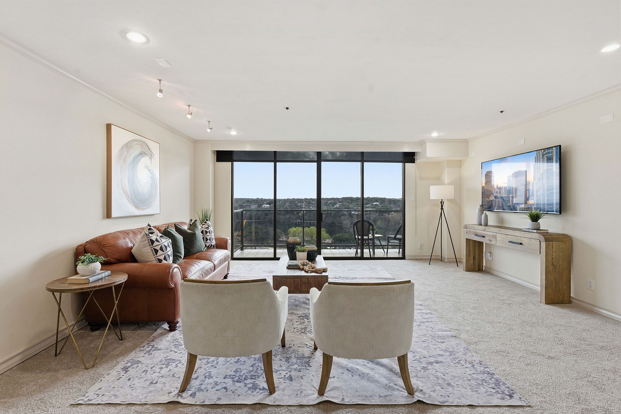 40 North Interstate Highway 35, Unit 10B4 Austin, TX 78701 - Photo 4 of 39 a living room with fireplace furniture and floor to ceiling window