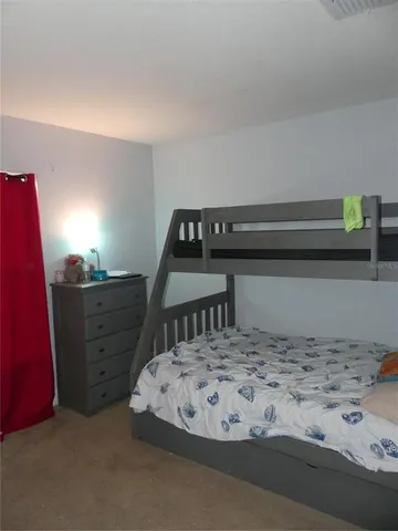 a view of a livingroom with furniture