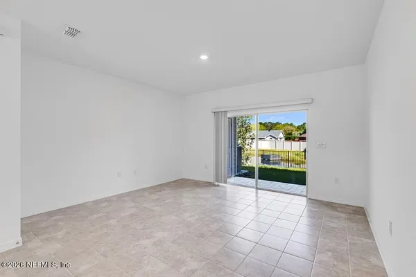 a view of kitchen with window and stainless steel appliances