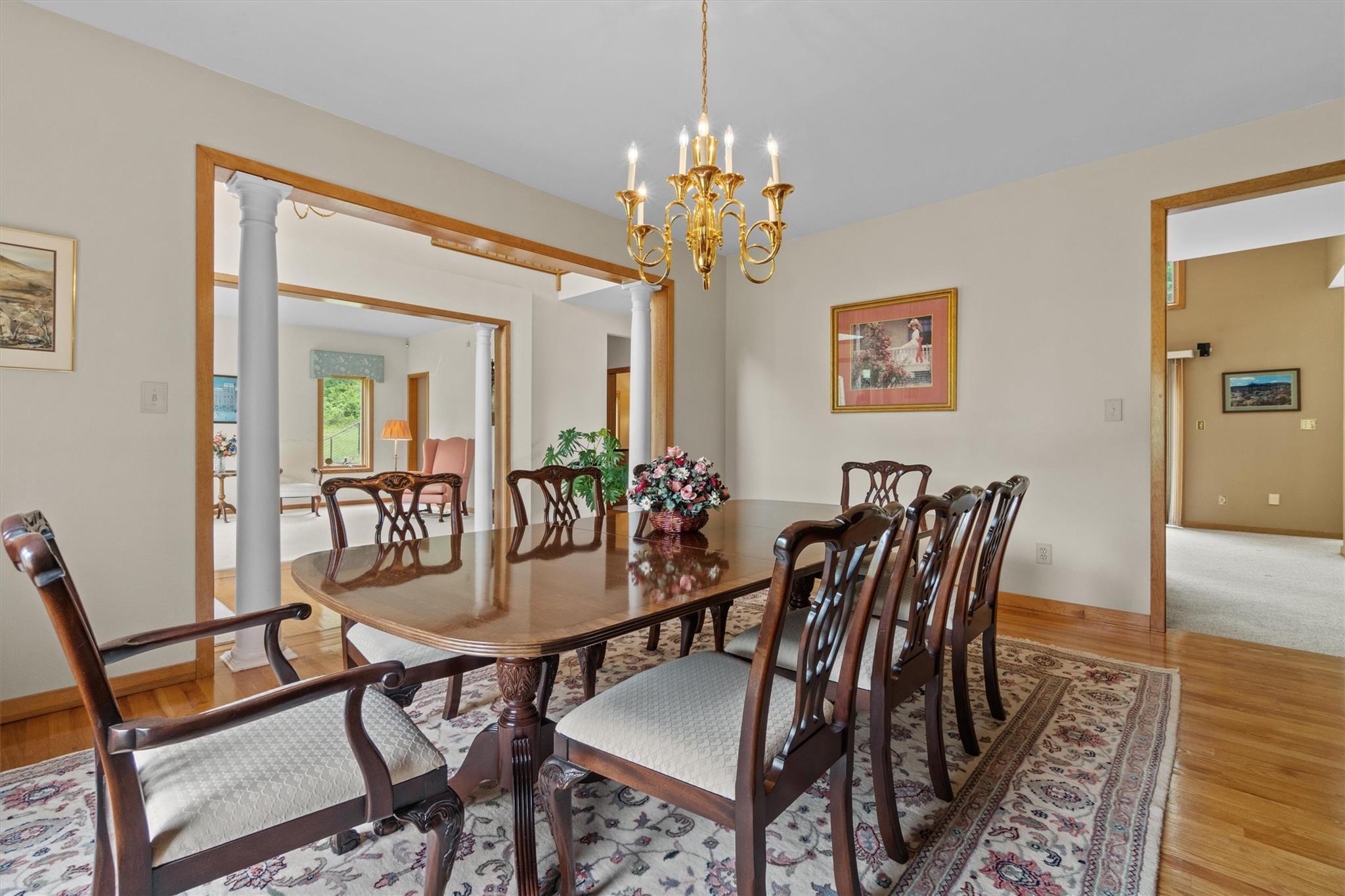 115 Moffat Road Washingtonville, NY 10992 - Photo 15 of 50 a view of a dining room with furniture and wooden floor