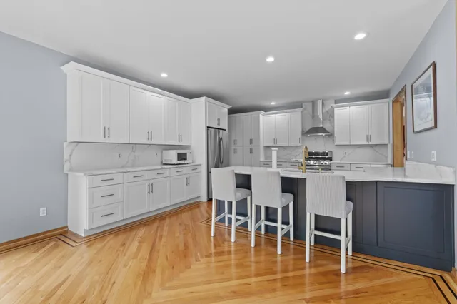 a view of kitchen with dining table and chairs