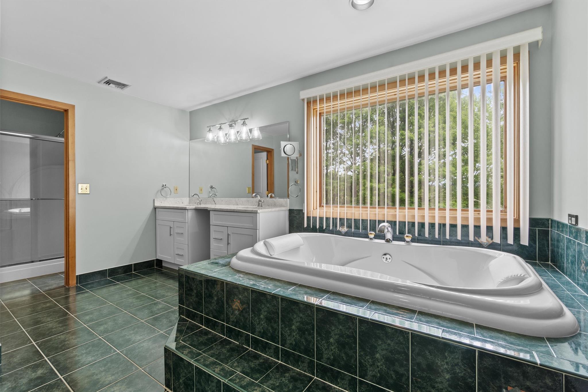 115 Moffat Road Washingtonville, NY 10992 - Photo 29 of 50 a bathroom with a tub sink and mirror