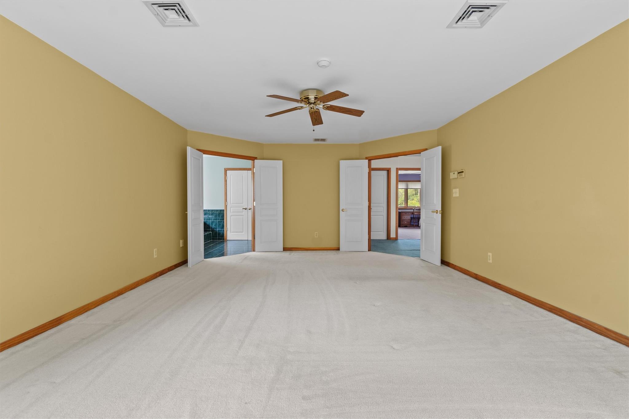 115 Moffat Road Washingtonville, NY 10992 - Photo 30 of 50 a view of an empty room with chandelier fan and windows