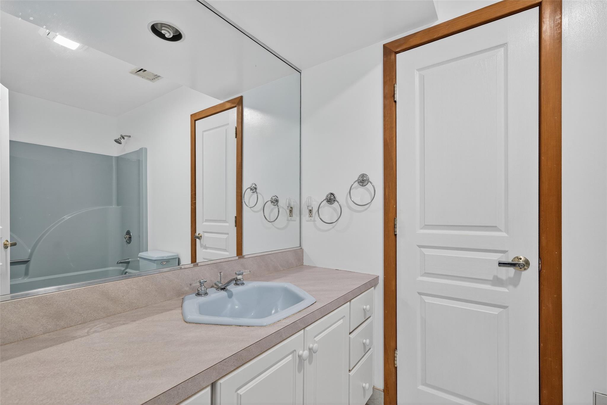 115 Moffat Road Washingtonville, NY 10992 - Photo 37 of 50 a bathroom with a granite countertop sink and a mirror