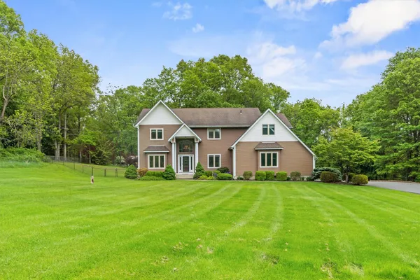 a view of swimming pool with a patio