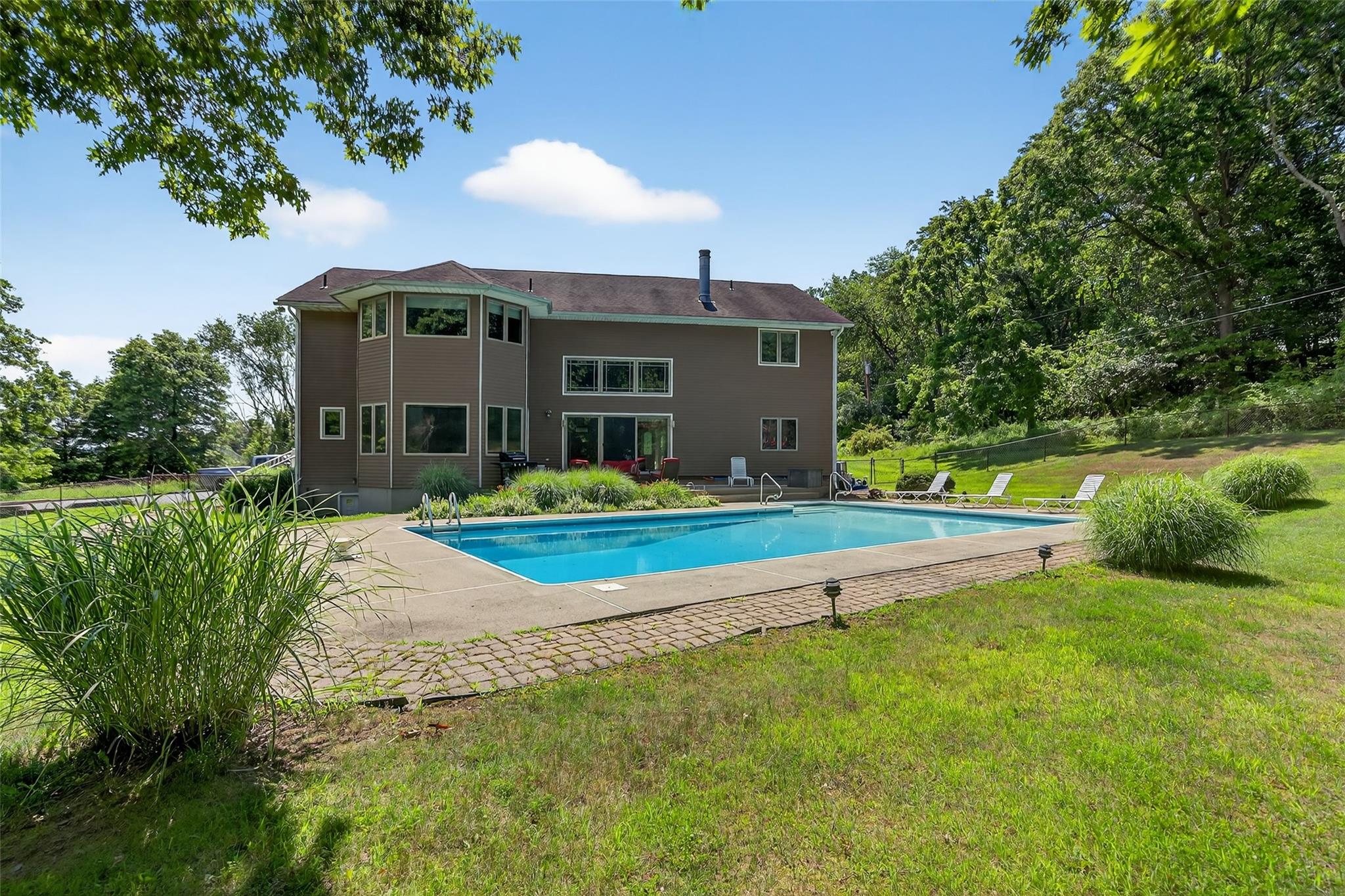 115 Moffat Road Washingtonville, NY 10992 - Photo 46 of 50 a view of a house with a yard and sitting area