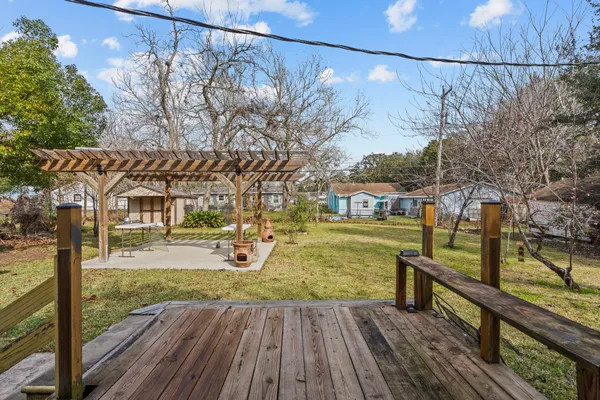 a view of a swimming pool with a patio
