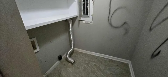 a bathroom with a shower and toilet