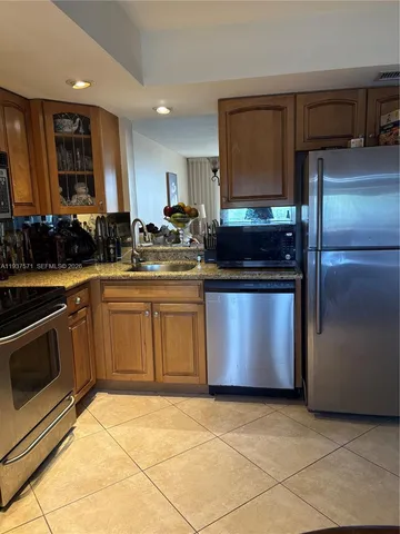 a bathroom with a sink toilet and vanity