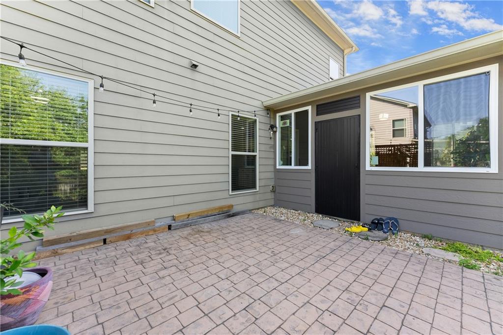 2228 Lakeview Bend Way Buford, GA 30519 - Photo 28 of 36 a front view of a house with plants