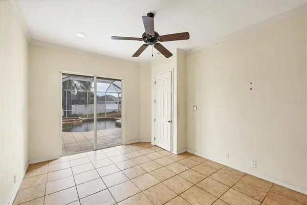 a spacious bathroom with a sink mirror and shower