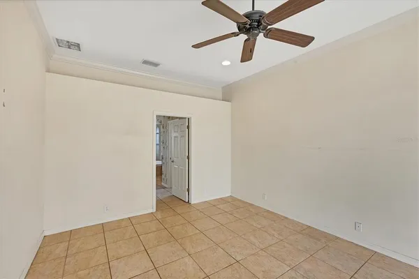 a spacious bathroom with a double vanity sink mirror and double