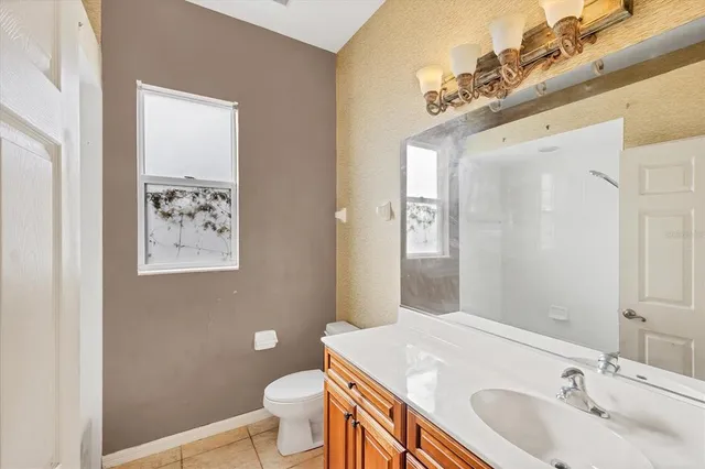 a view of a hallway with windows