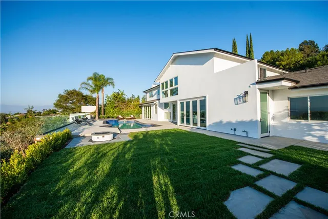 a view of city and green space