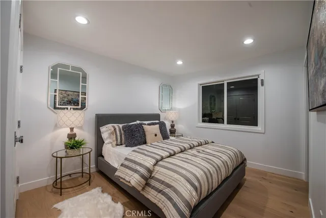 a bathroom with a shower sink and mirror