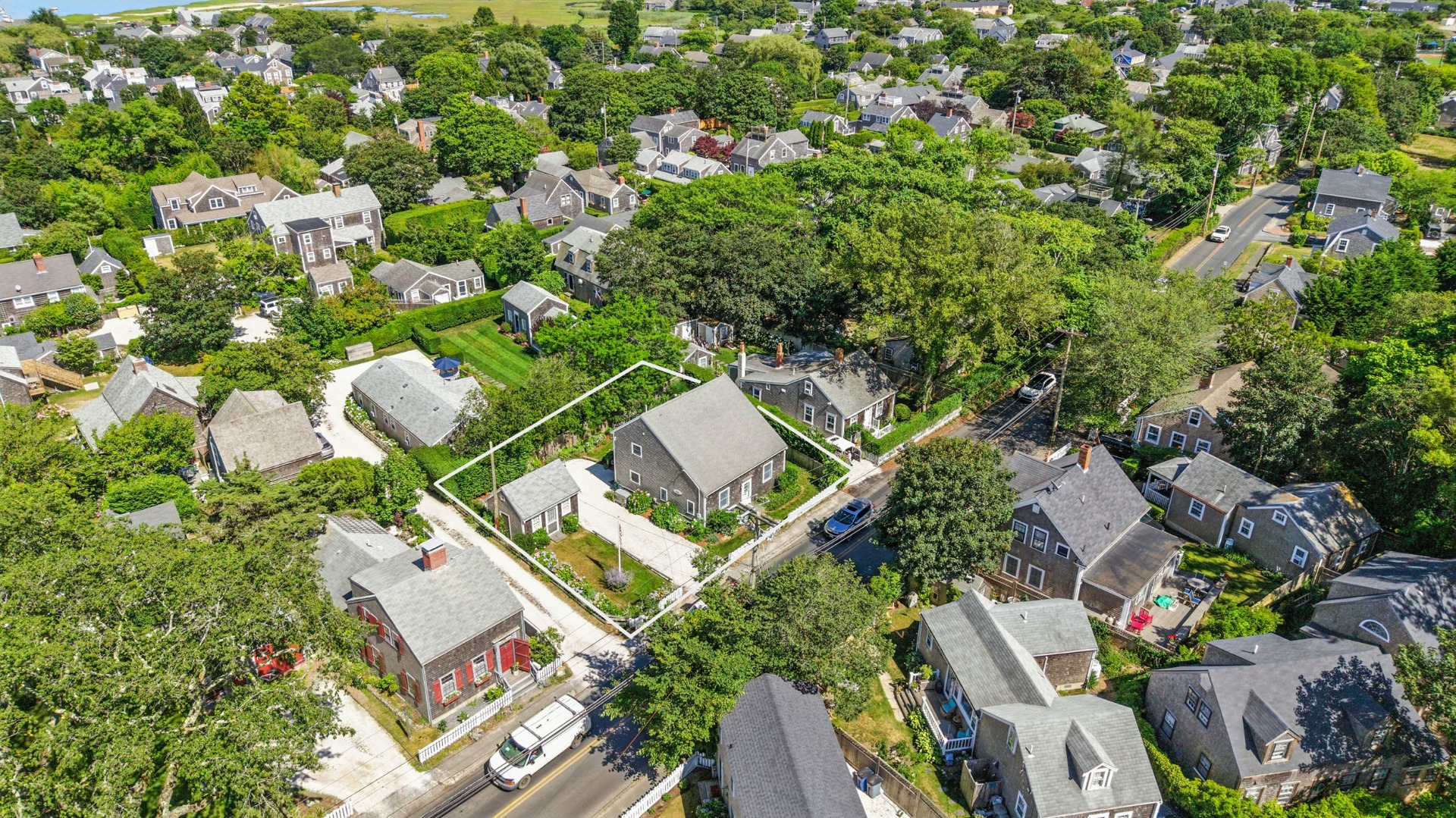 52 Pleasant Street Nantucket, MA 02554 - Photo 34 of 36 an aerial view of residential house with outdoor space and trees all around
