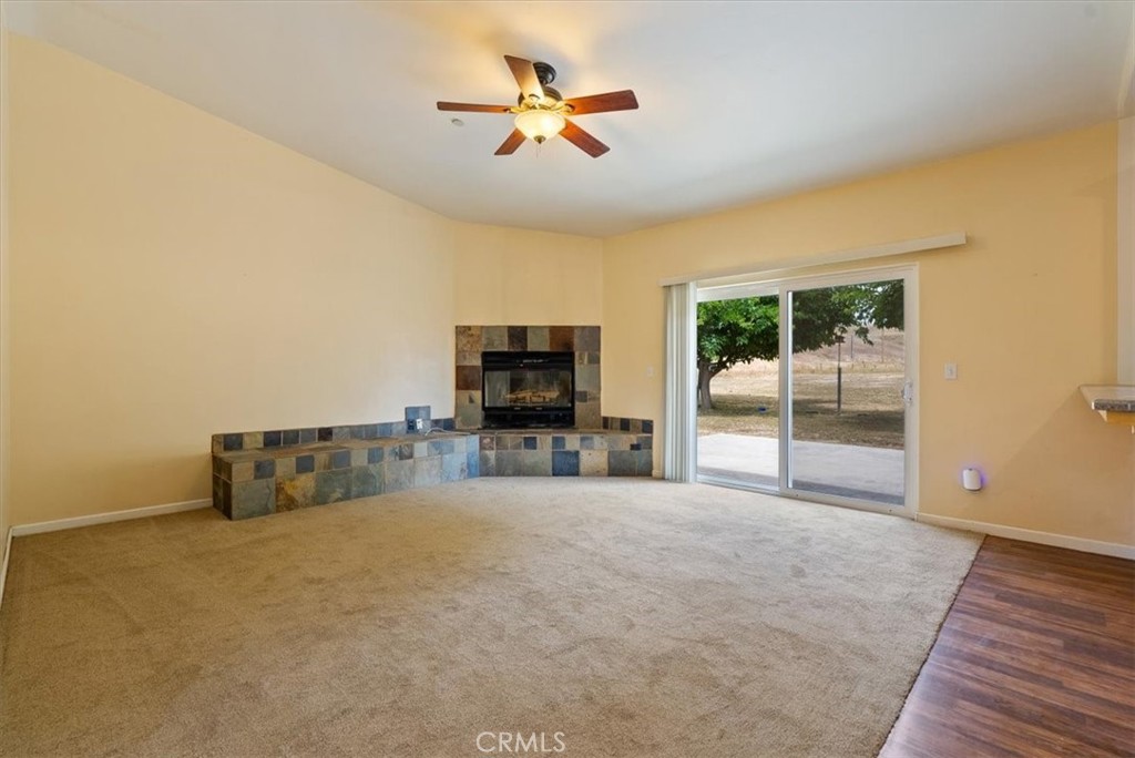 76846 Ranchita Canyon Road San Miguel, CA 93451 - Photo 8 of 51 wooden floor to ceiling window and a flat screen tv