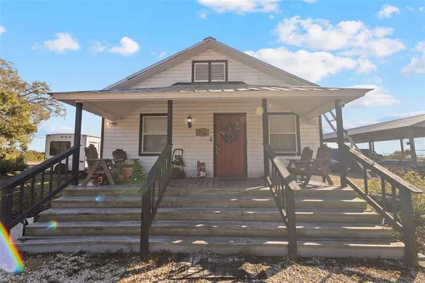 a spacious bathroom with a sink and a mirror