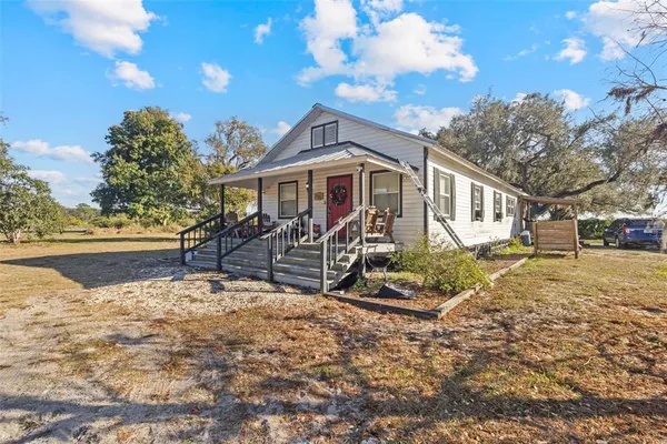 a house view with a garden space