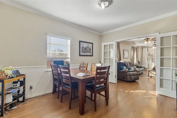 a view of a dining room with furniture