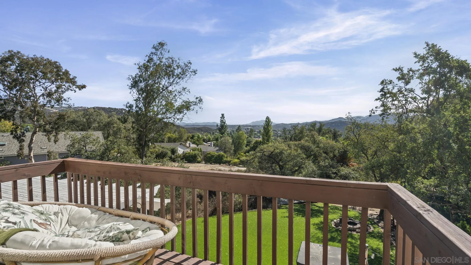24249 Sargeant Road Ramona, CA 92065 - Photo 19 of 46 a view of a roof deck with wooden fence