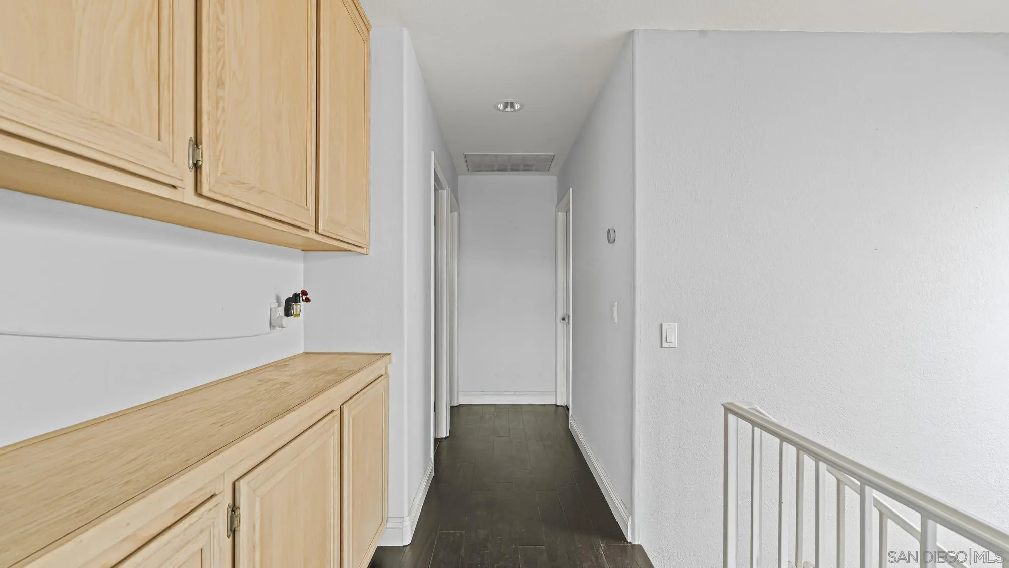 24249 Sargeant Road Ramona, CA 92065 - Photo 28 of 46 a view of a kitchen from the hallway