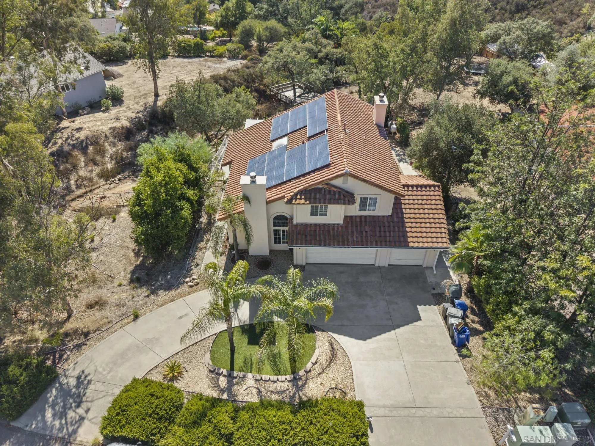 24249 Sargeant Road Ramona, CA 92065 - Photo 40 of 46 a front view of a house with a yard
