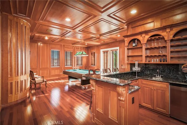 a open kitchen with stainless steel appliances granite countertop a sink and cabinets
