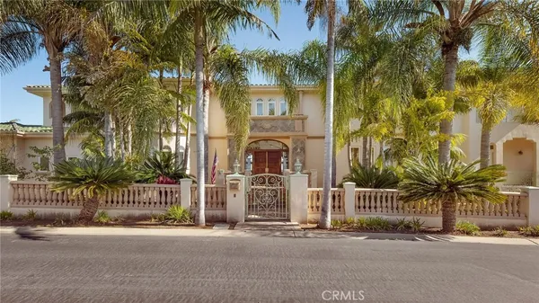 front view of a house with a garden