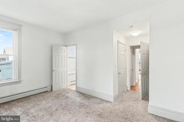 a view of an empty room and window