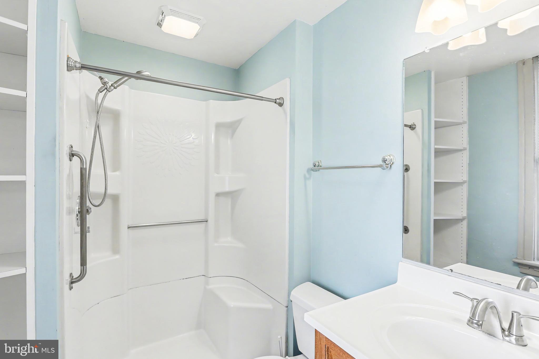 143 15th Street, Unit 1 New Cumberland, PA 17070 - Photo 7 of 10 a bathroom with a bathtub and a sink