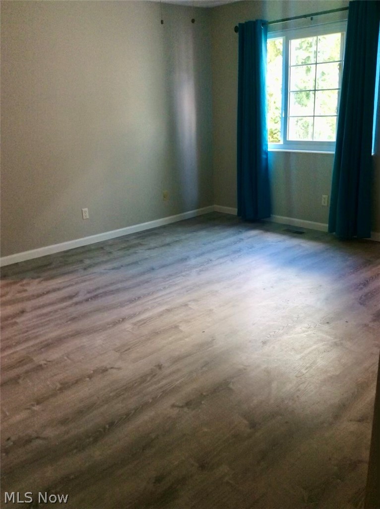 10071 Hazelton Road Streetsboro, OH 44241 - Photo 14 of 16 Spare room featuring hardwood / wood-style flooring