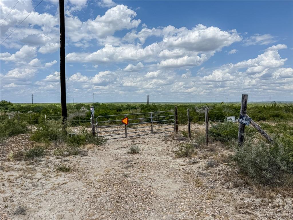 Lot 9 North Fm 3167 Rio Grande City, TX 78582 - Photo 1 of 15 a view of a dry yard with wooden fence