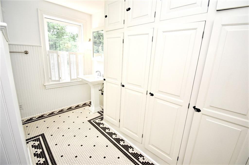 149 Bertha Road Burgettstown, PA 15021 - Photo 22 of 25 a bathroom with a sink a toilet and a window