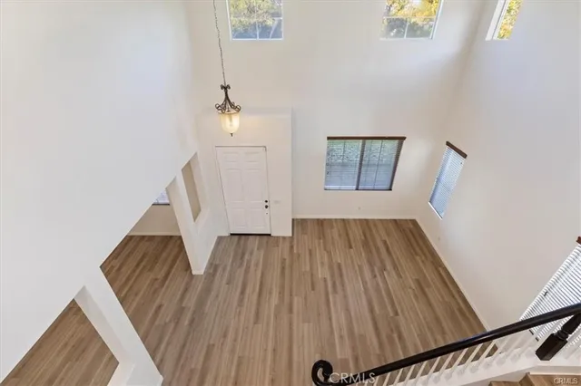 a view of front door with wooden floor