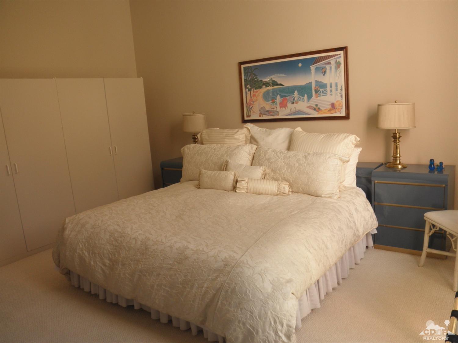 47432 Rabat Drive Palm Desert, CA 92260 - Photo 15 of 21 a bedroom with a bed and a desk