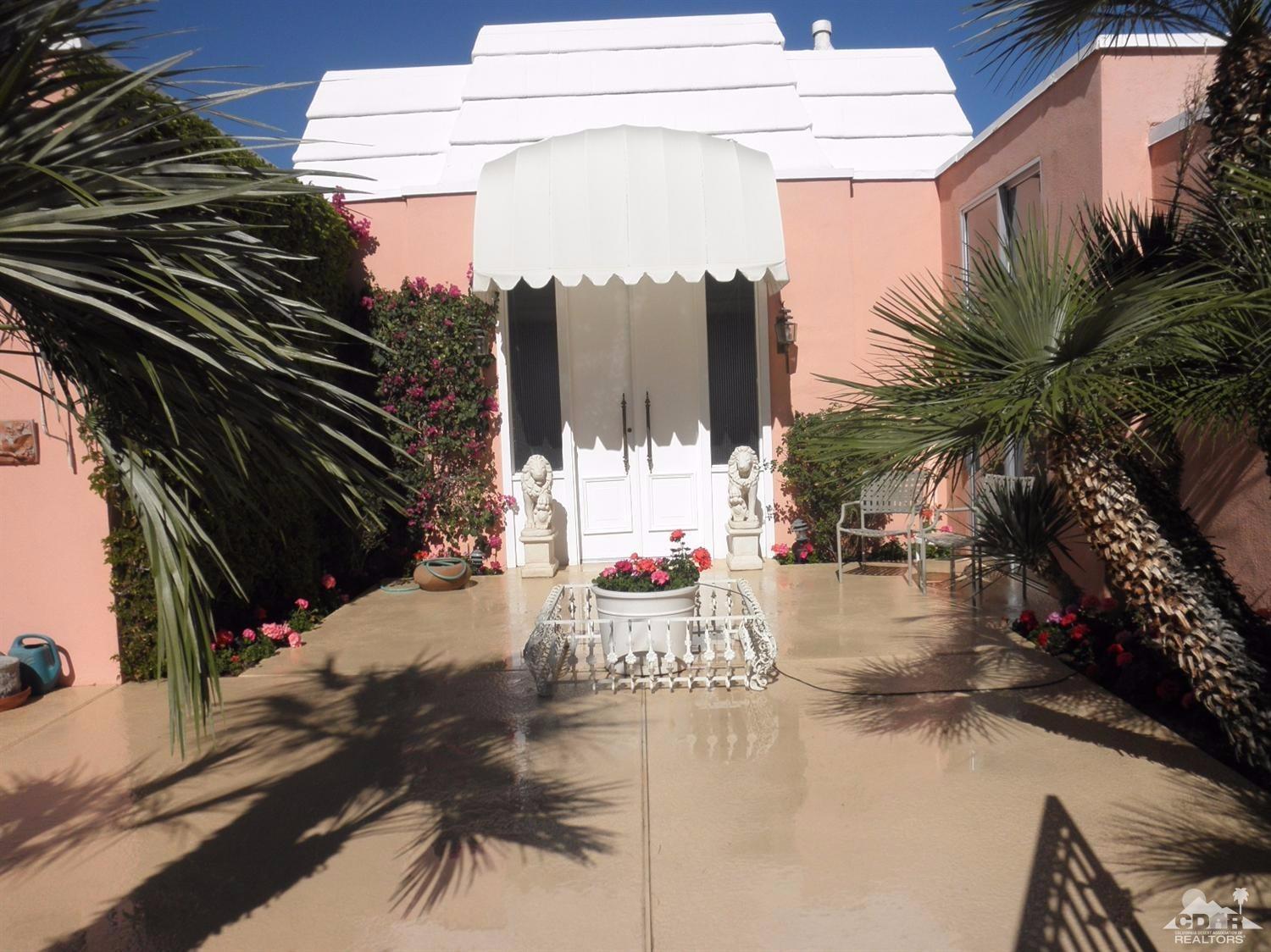 47432 Rabat Drive Palm Desert, CA 92260 - Photo 2 of 21 a view of living room and patio