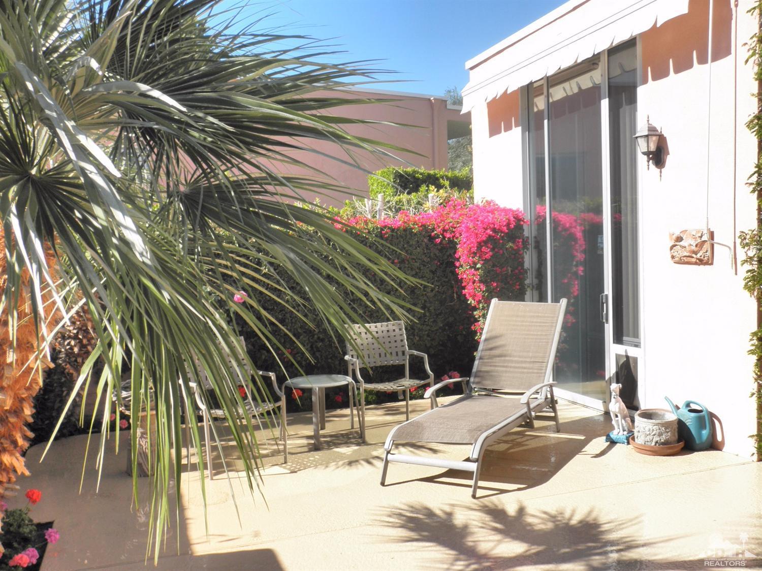 47432 Rabat Drive Palm Desert, CA 92260 - Photo 3 of 21 a view of a chairs and table in the patio