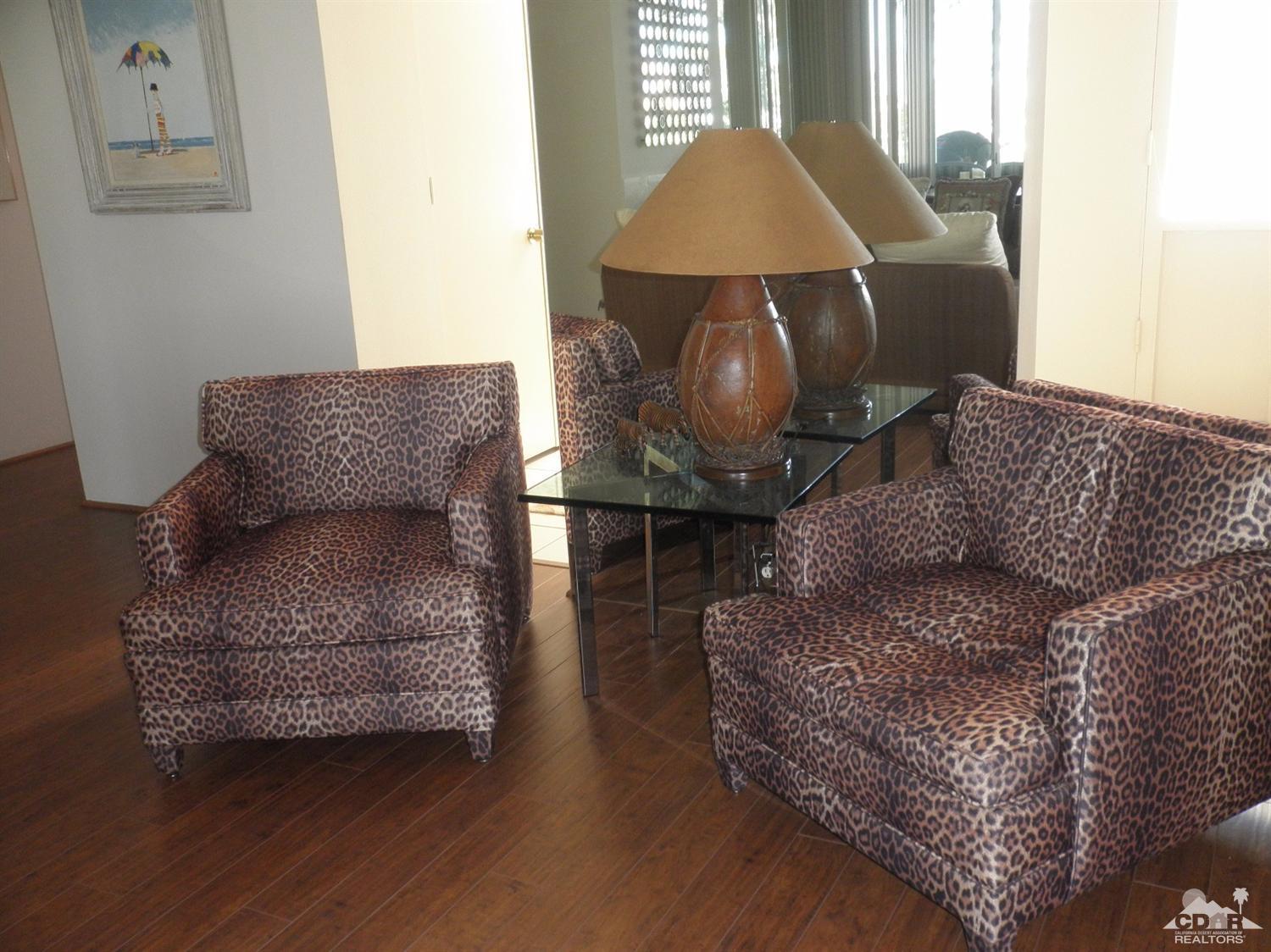 47432 Rabat Drive Palm Desert, CA 92260 - Photo 6 of 21 a living room with furniture and a wooden floor