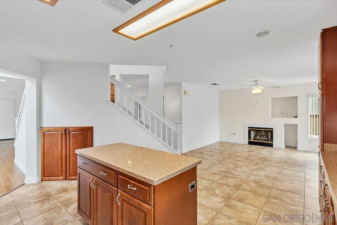 117 Willow Pond Road Santee, CA 92071 - Photo 17 of 49 a view of a kitchen with furniture and staircase