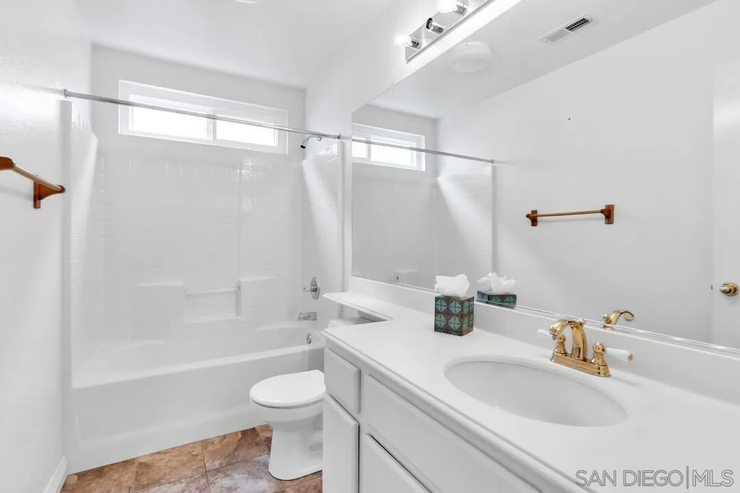 117 Willow Pond Road Santee, CA 92071 - Photo 26 of 49 a bathroom with a sink toilet tub and shower