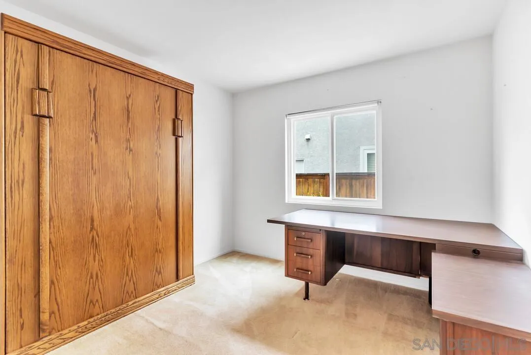 117 Willow Pond Road Santee, CA 92071 - Photo 28 of 49 a room with a table and a window