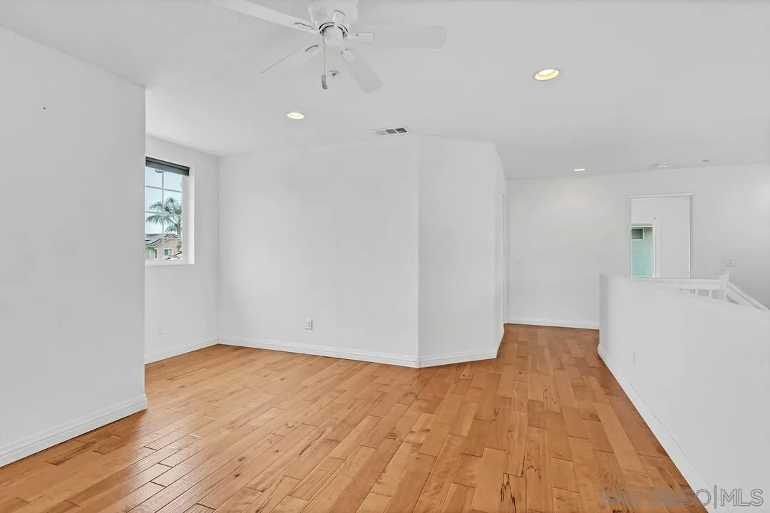 117 Willow Pond Road Santee, CA 92071 - Photo 30 of 49 a view of empty room with wooden floor