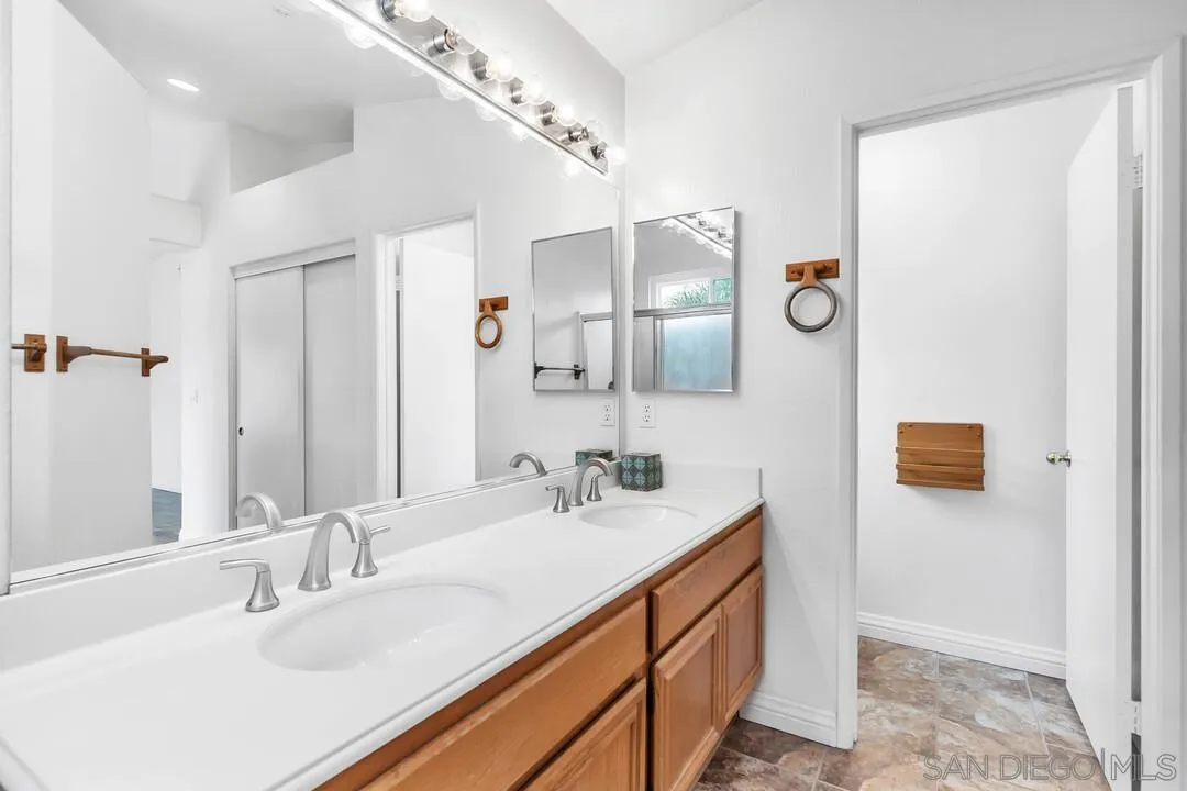 117 Willow Pond Road Santee, CA 92071 - Photo 39 of 49 a bathroom with a double vanity sink mirror and