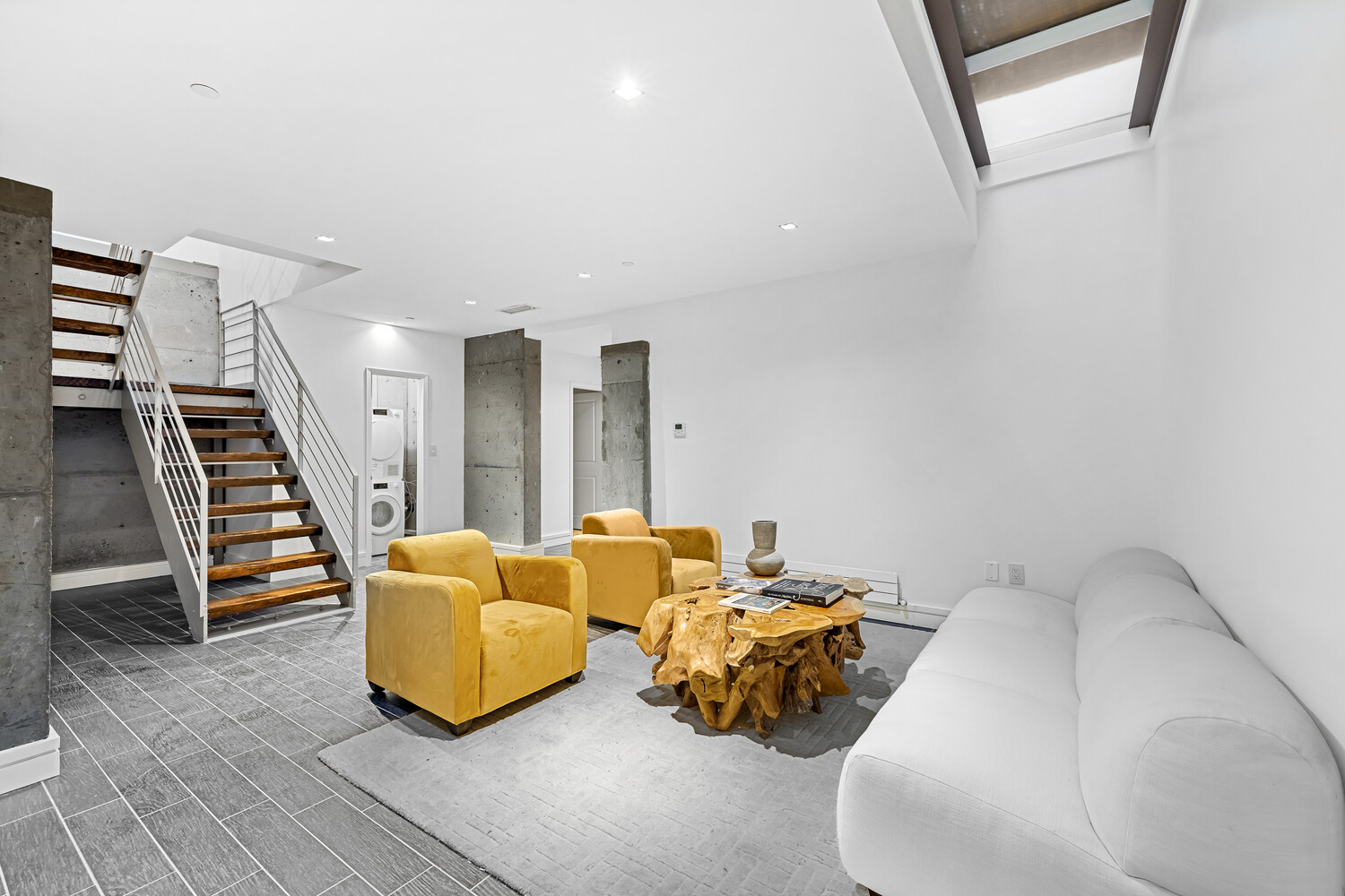 232 Adelphi Street, Unit 4 Brooklyn, NY 11205 - Photo 13 of 15 a bedroom with furniture and stairs